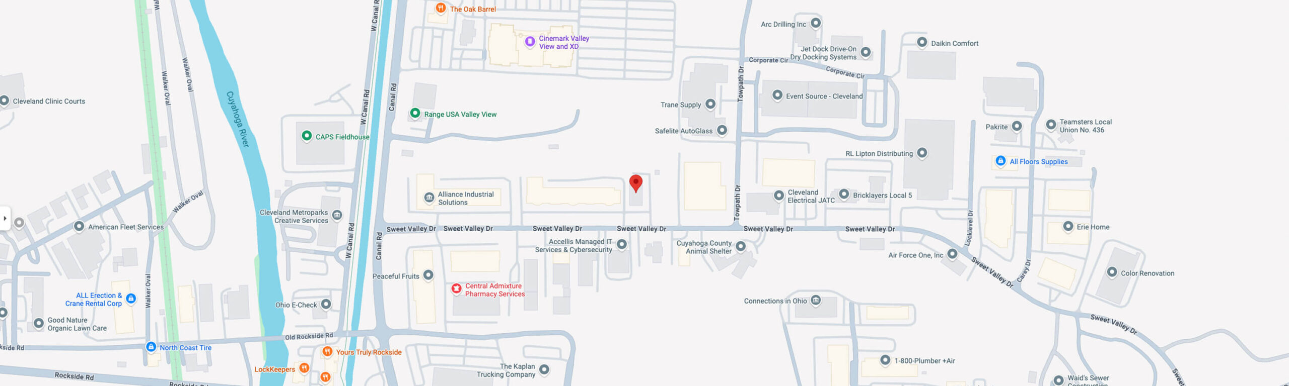 Map showing a section of a city with labeled streets, businesses, and landmarks. A red location pin marks a specific spot near Saani Street, with nearby roads, shops, and pharmacies visible.