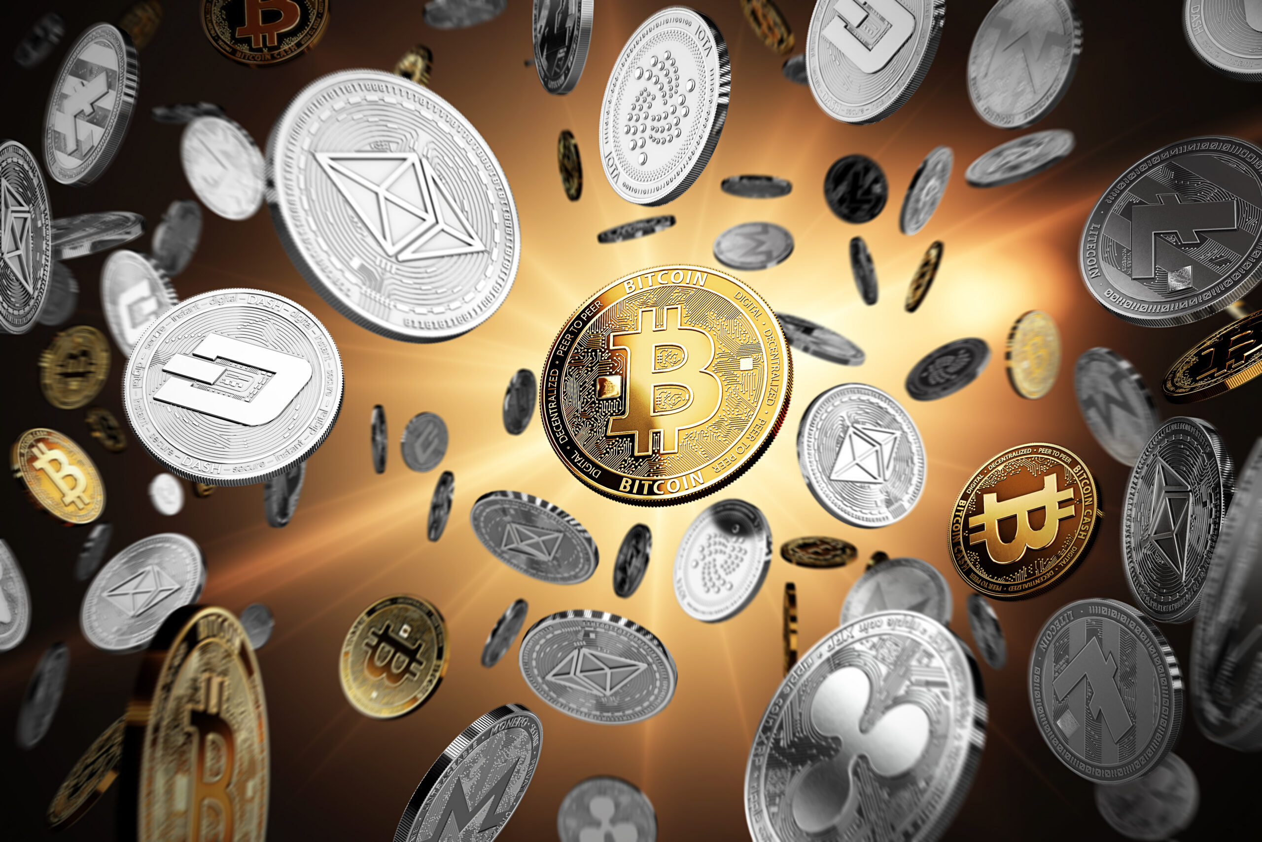 Various cryptocurrency coins, including Bitcoin, Ethereum, and Ripple, are floating against a glowing, dramatic background, symbolizing digital currency and blockchain concepts.